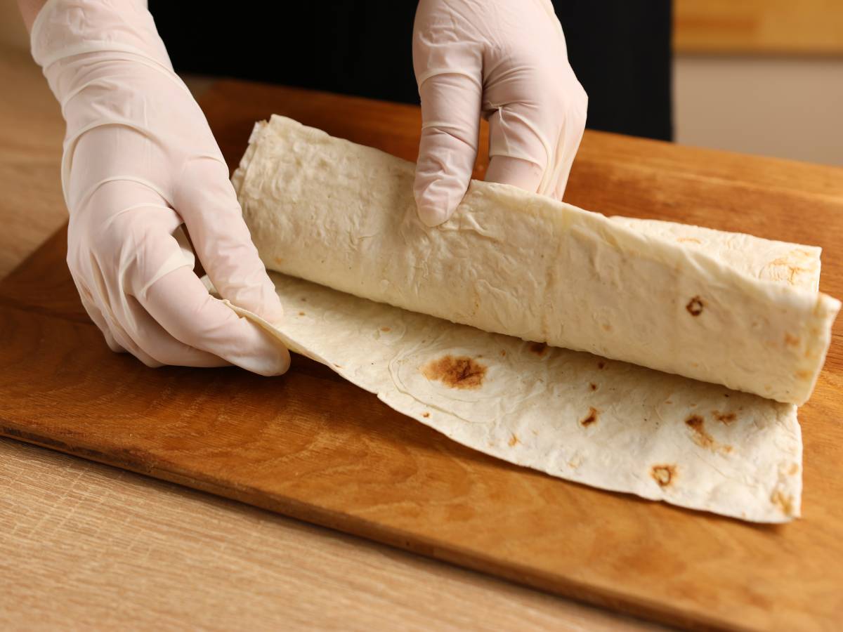 Lavash unfolds on the table