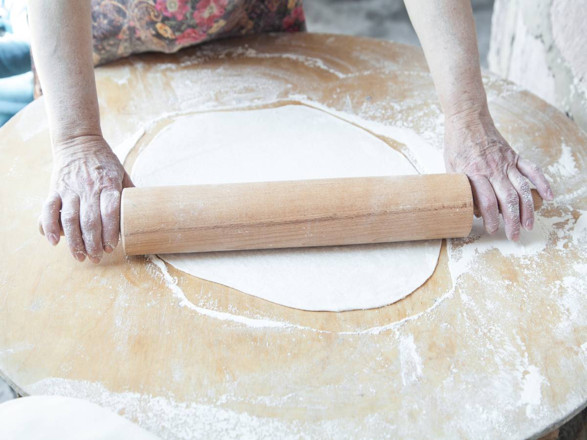 Woman preparing armenian bread lavash